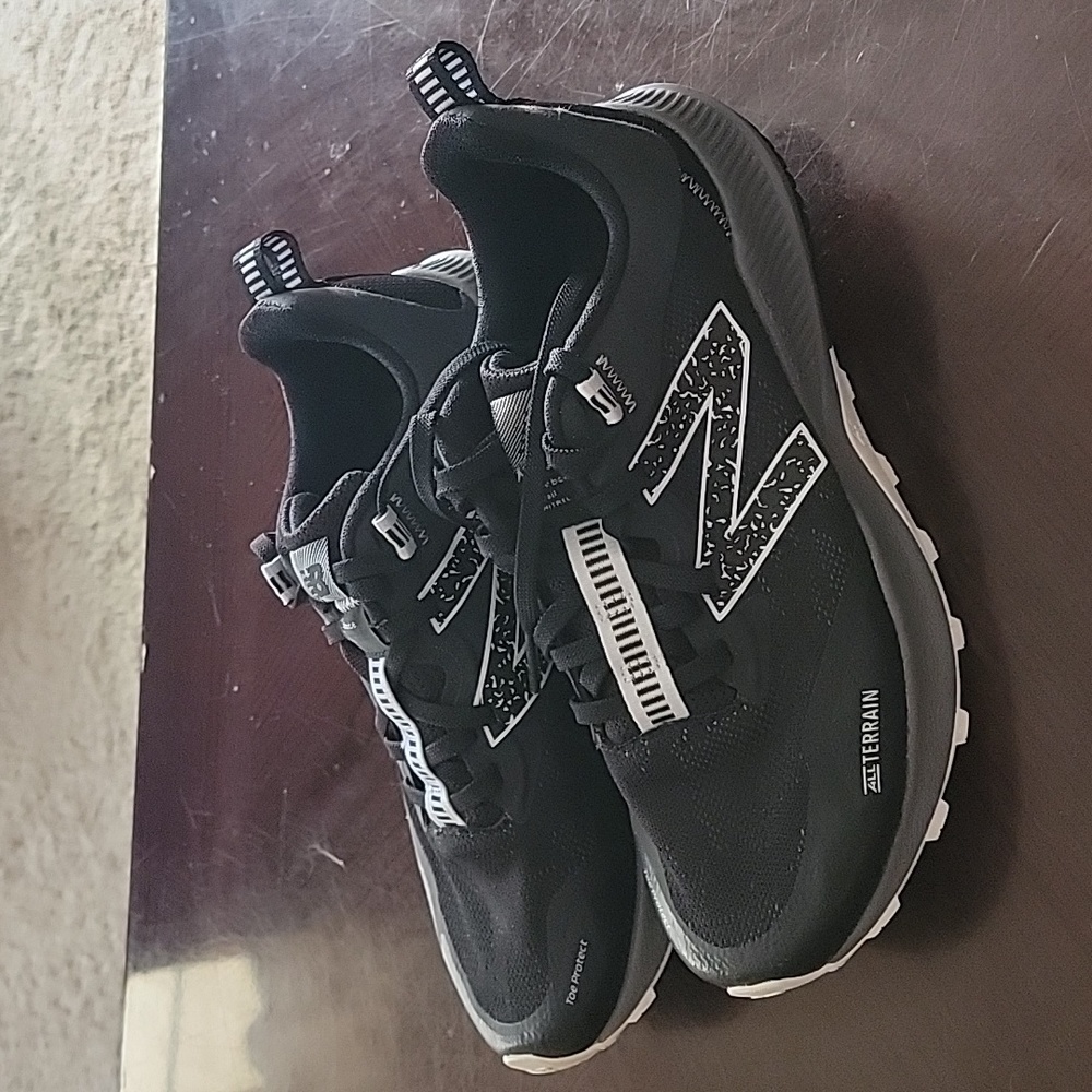 New Balance Black and White All Terrain Athletic Shoes